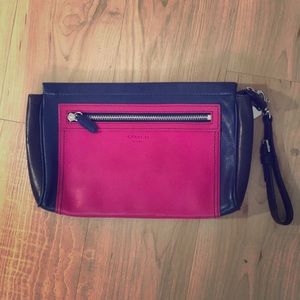 Blue, black and pink coach clutch